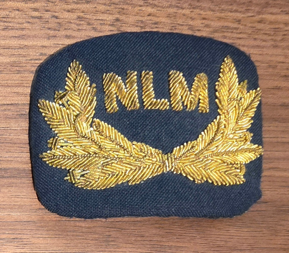 NLM City Hopper Airlines Cap Badge